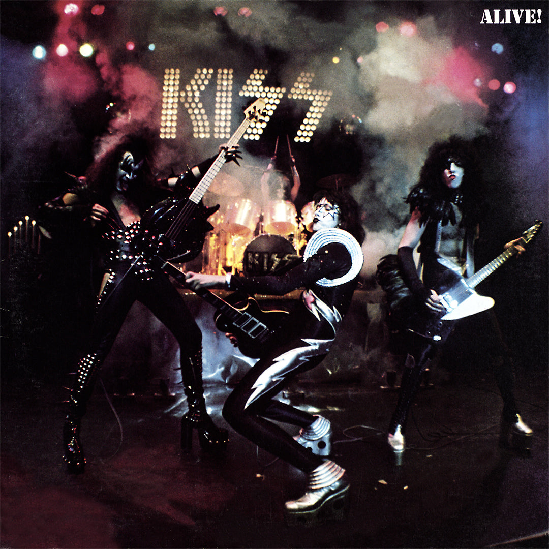 KISS album cover with band members rocking out on stage and 'Alive!' text.