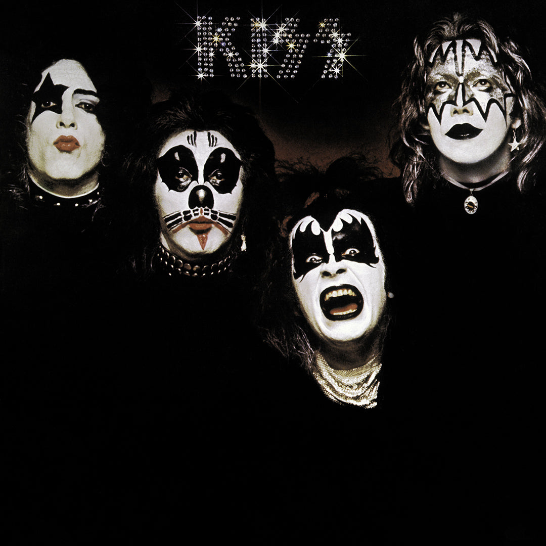 Four band members with makeup and the text 'KISS' on a black background